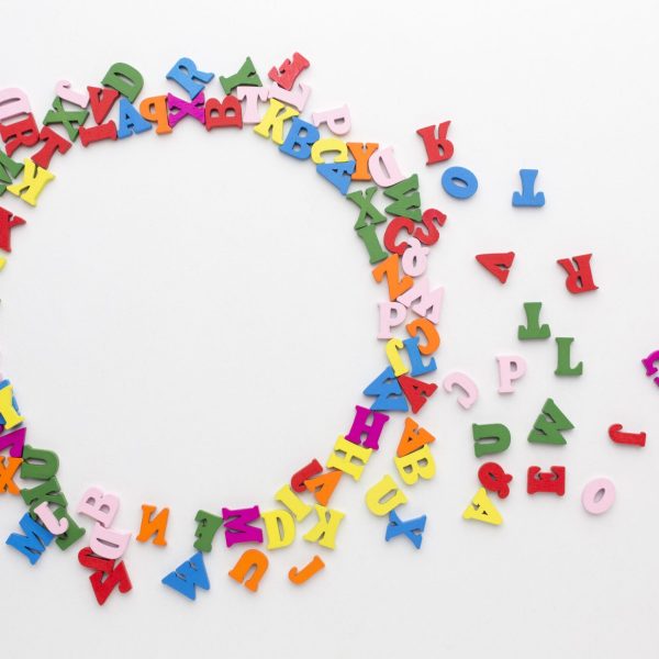 flat-lay-colorful-alphabet-frame-concept